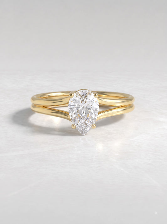 1.5 CT Pear Cut Lab Grown Diamond Solitaire Split shank Engagement Ring