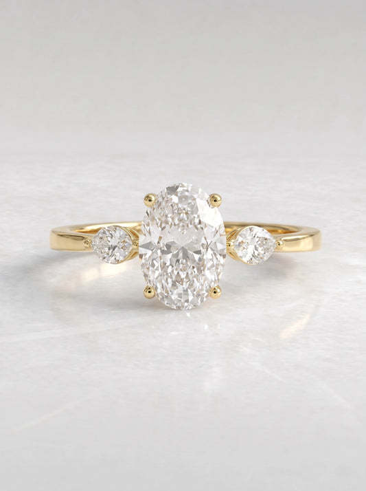 The Juliette Oval Cut Lab-Grown Diamond Three Stone Hidden Halo Engagement Ring - View 2