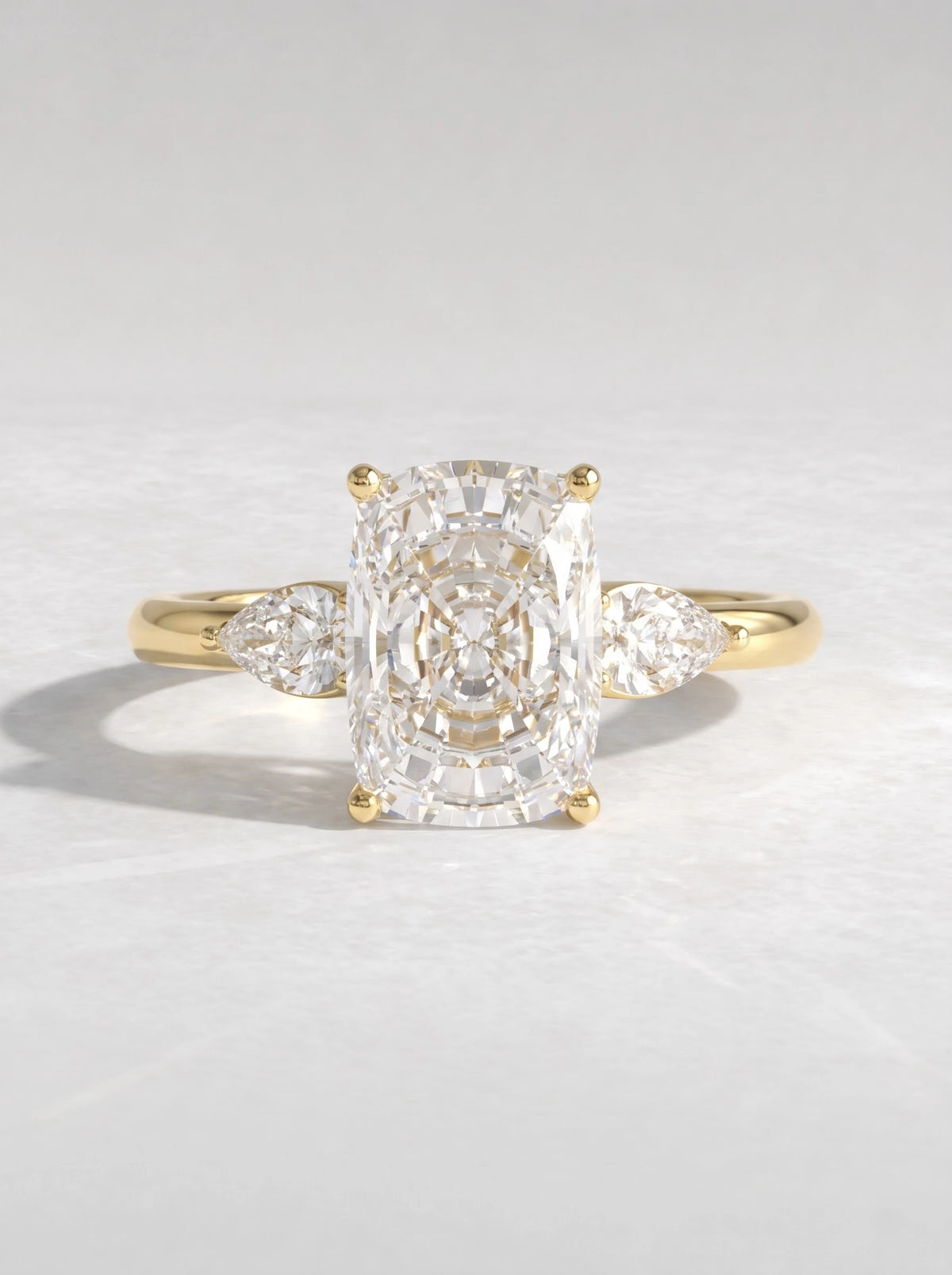 The Eloise Cushion Cut Lab-Grown Diamond Three Stone Hidden Halo Bridal Ring