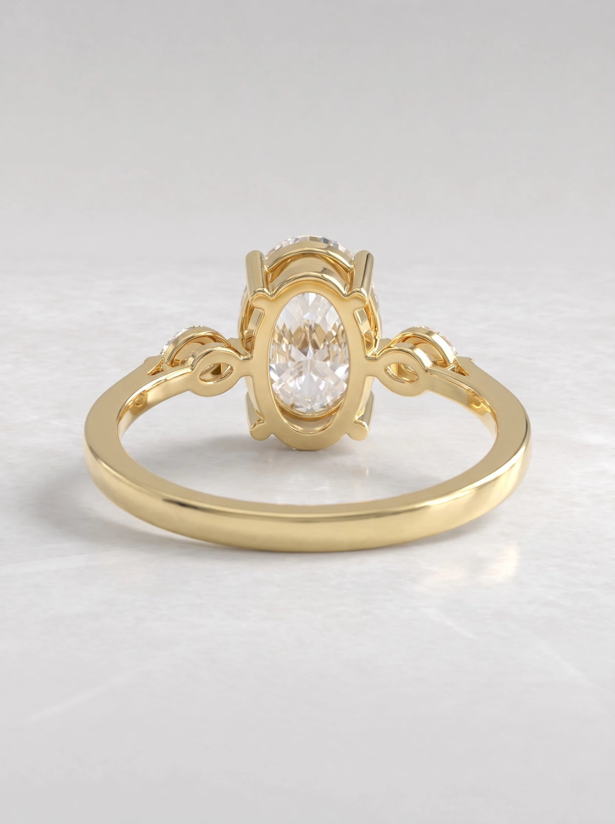 The Juliette Oval Cut Lab-Grown Diamond Three Stone Hidden Halo Engagement Ring - View 5