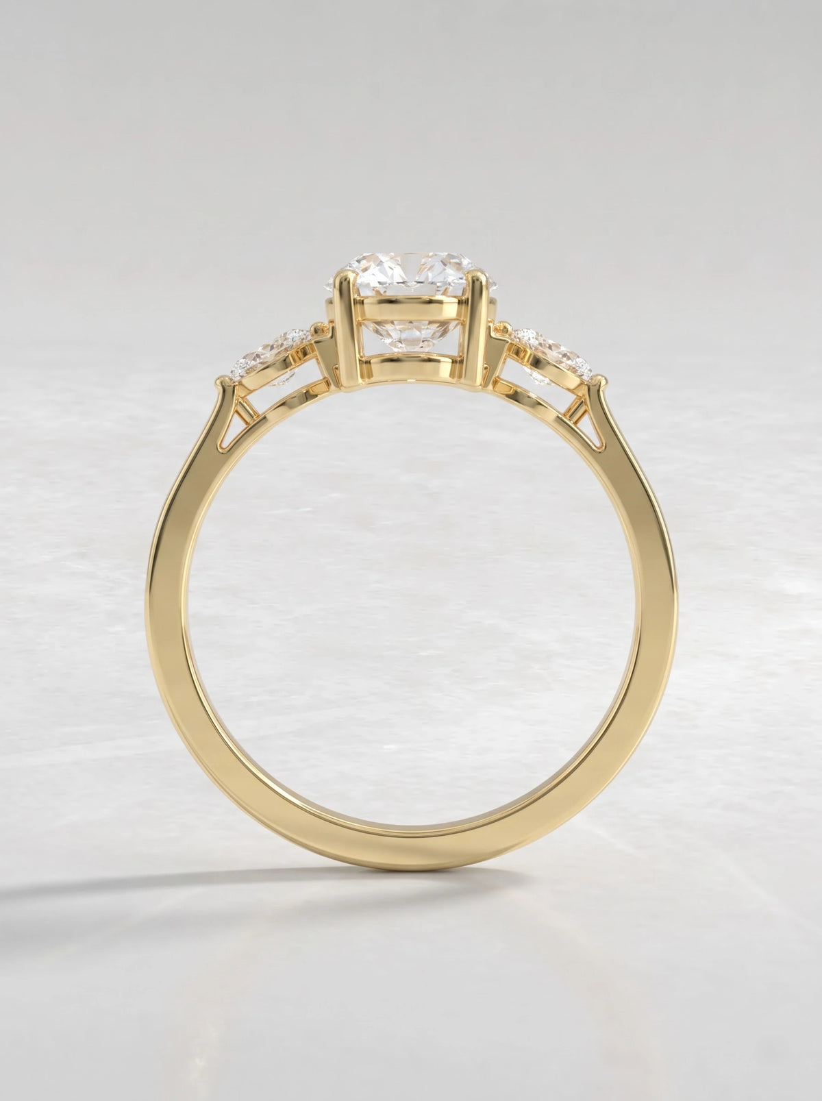 The Juliette Oval Cut Lab-Grown Diamond Three Stone Hidden Halo Engagement Ring - View 6